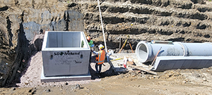 The Champlain Parkway included several stormwater features including the construction of a stormwater detention pond near Englesby Brook. Pictured primary outlet structure.
