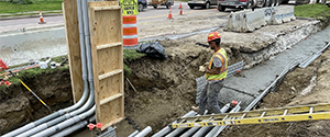 Installation of the electrical and communication duct bank along Pine Street just north of Lakeside Avenue.