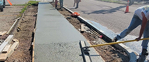Construction of new concrete sidewalks along Sears Lane.