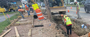 Installation of the new concrete sidewalk and drainage infrastructure on Pine Street just north of Kilburn Street.