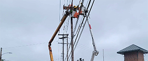 Process of relocating the power lines from overhead and running them through the underground duct banks at the intersection of Pine Street at Lakeside Avenue.