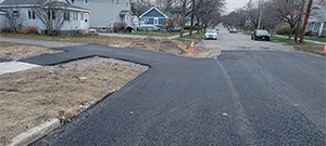 Temporary paving of Lyman Avenue prior to the winter shutdown after construction season 1.