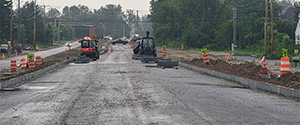 Installation of granite curb along the Parkway between Home Avenue and Flynn Avenue.