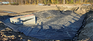 The Champlain Parkway included several stormwater features including the construction of a stormwater detention pond near Englesby Brook. Pictured geomembrane liner.
