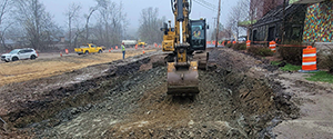 Crews begin full-depth excavation of Briggs Street near Flynn Avenue.