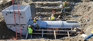 The Champlain Parkway included several stormwater features including the construction of a stormwater detention pond near Englesby Brook. Pictured primary outlet structure.